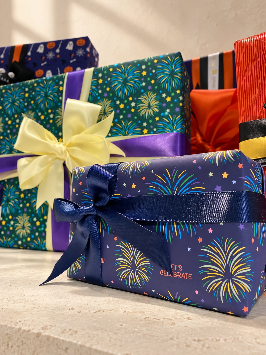 Firework-patterned wrapping and satin ribbons